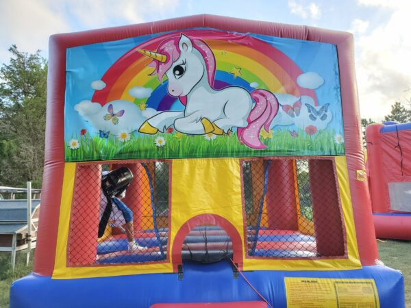 Inflatable moon bounce with unicorn