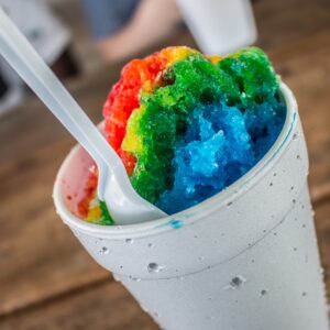 Mulitcolor snow cone in white styrofoam cup