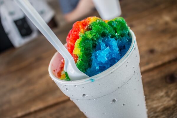 Mulitcolor snow cone in white styrofoam cup